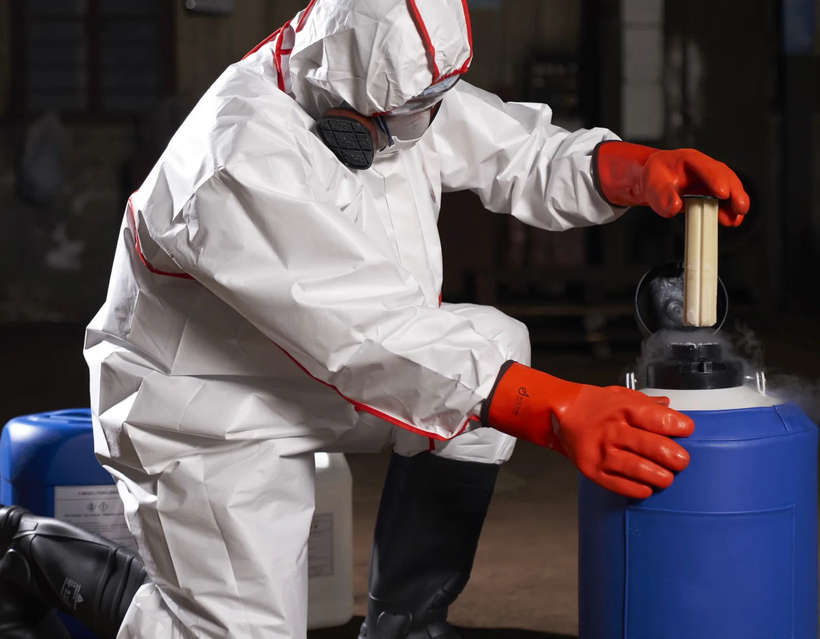 Protective gloves being used for cold-work handling